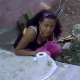 A girl is taking a piss and a shit outside on the ground, when all of a sudden, her friend surprises her with a video camera! Over half a minute.